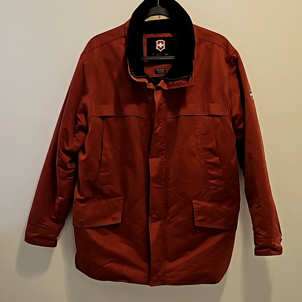 Victorinox Ski Jacket. Men's medium. Dark orange/red.